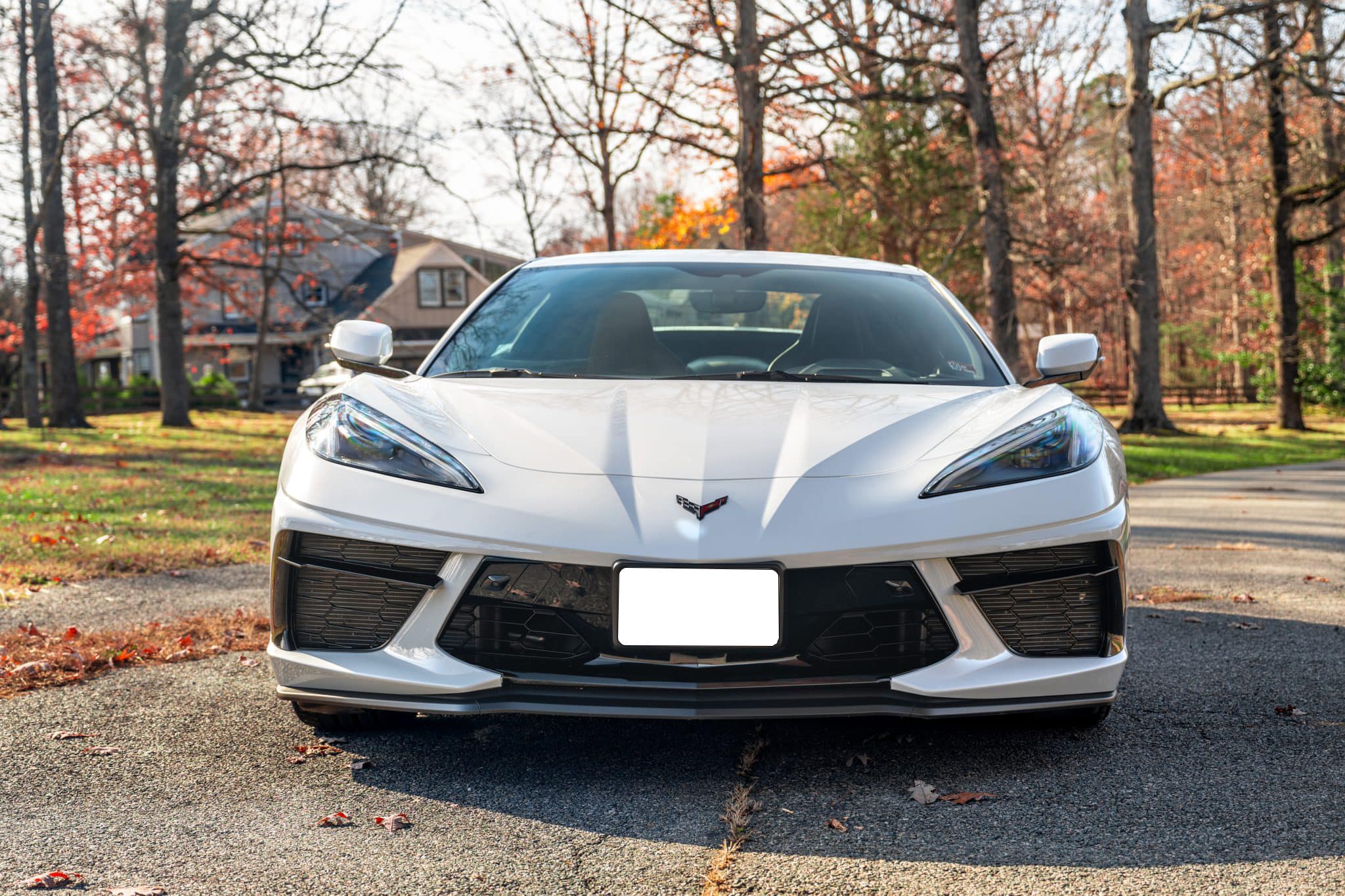 White Chevrolet Corvette Stingray convertible photographed from the rear