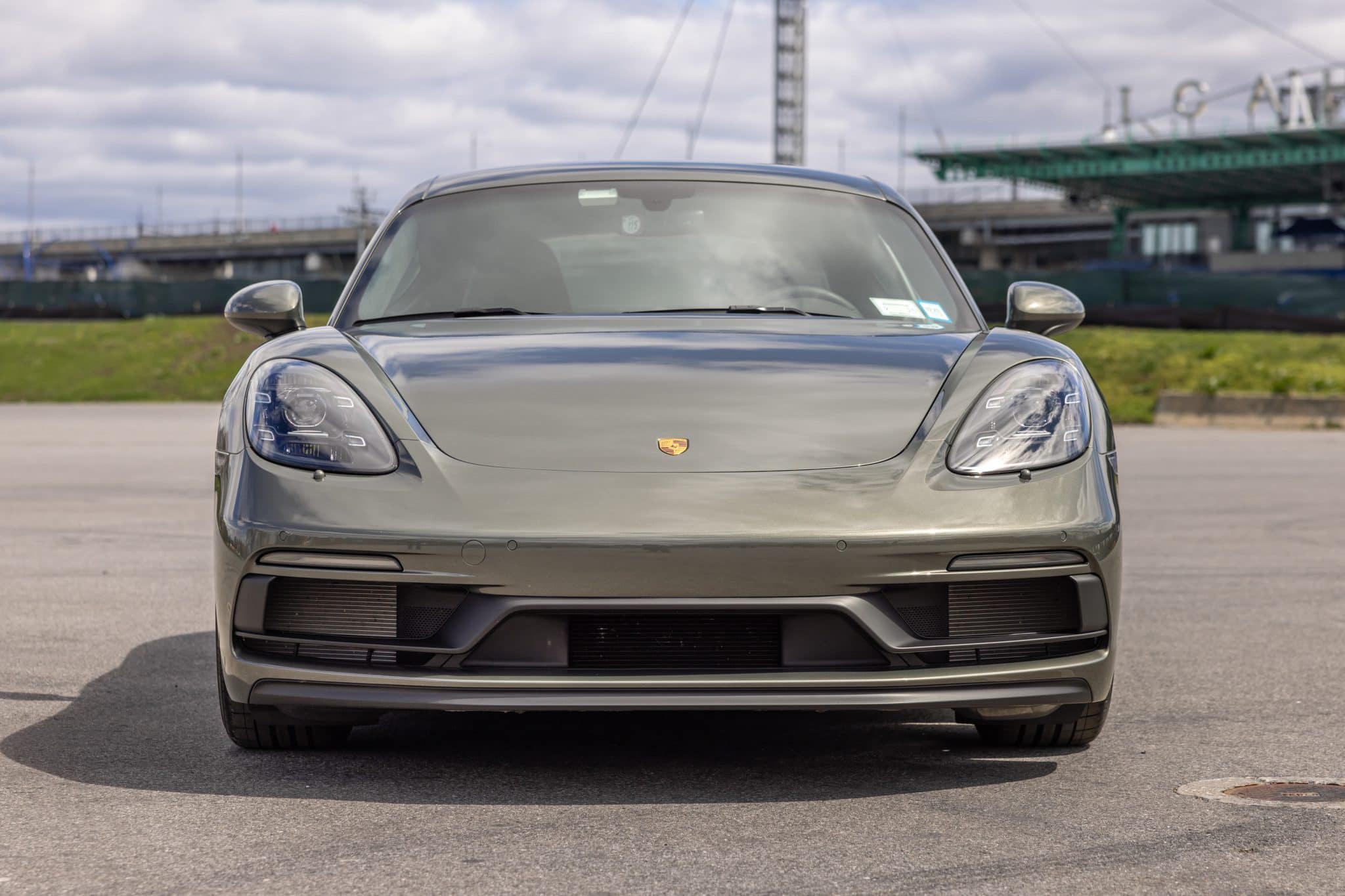Grey Porsche 718 Cayman GTS 4.0 photographed head-on for a Carviondealer listing